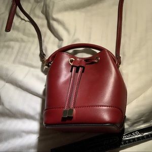dark red bucket purse